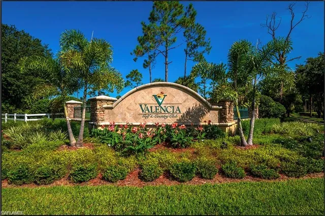 a garden view with a fountain