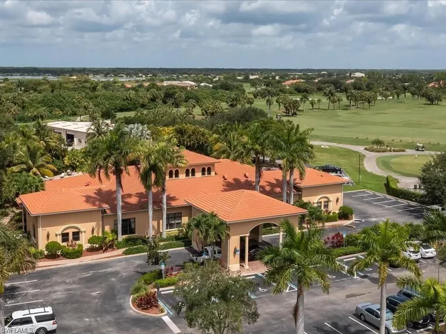 an aerial view of a houses with outdoor space