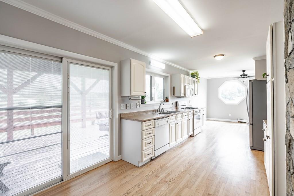 109 New Ludlow Road Granby, MA 01033 - Photo 19 of 42 a large kitchen with a lot of counter space and a wooden floors