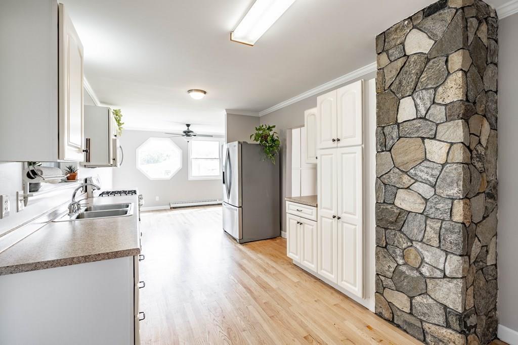 109 New Ludlow Road Granby, MA 01033 - Photo 20 of 42 view of a kitchen with a sink and wooden floor