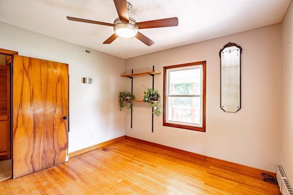109 New Ludlow Road Granby, MA 01033 - Photo 25 of 42 a view of an empty room with a window