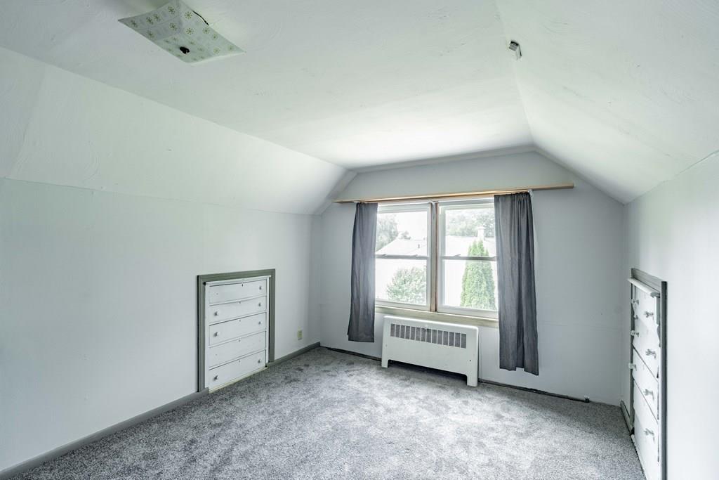 109 New Ludlow Road Granby, MA 01033 - Photo 32 of 42 an empty room with windows