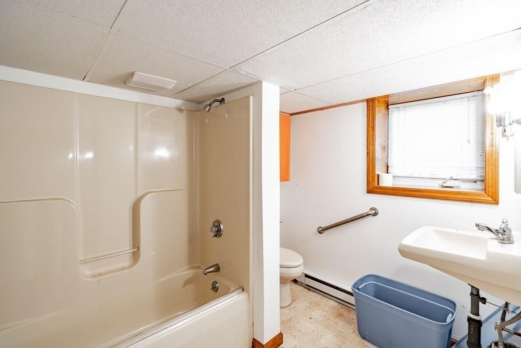 109 New Ludlow Road Granby, MA 01033 - Photo 33 of 42 a bathroom with a sink a toilet and shower