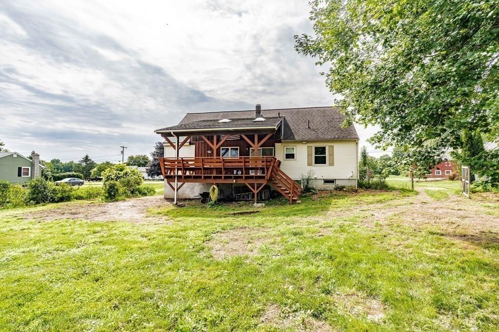109 New Ludlow Road Granby, MA 01033 - Photo 38 of 42 front view of a house with a big yard