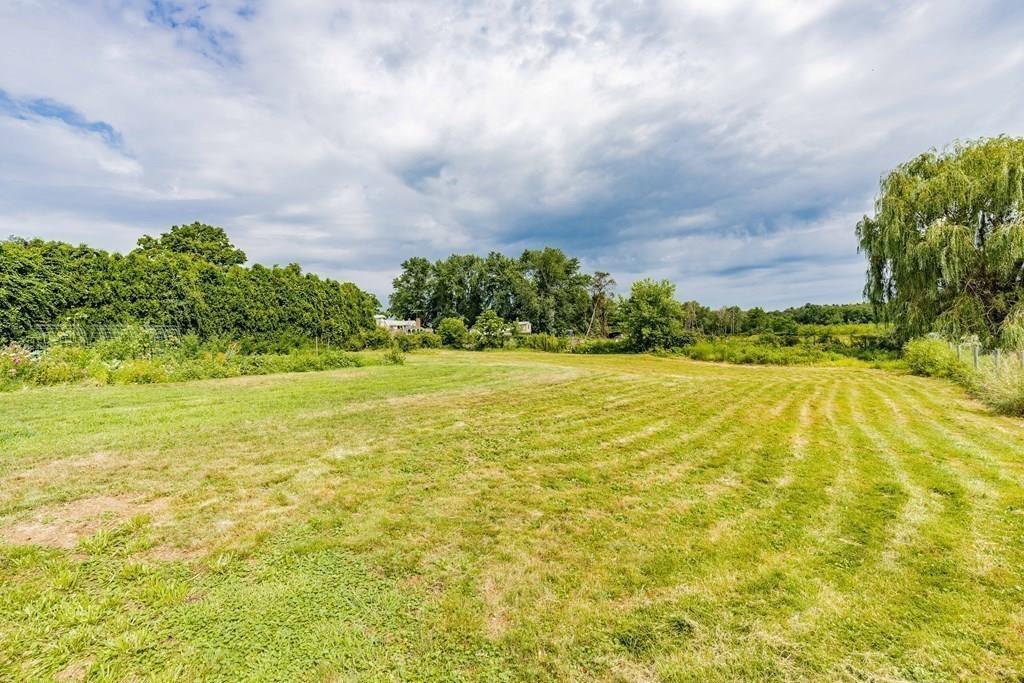 109 New Ludlow Road Granby, MA 01033 - Photo 39 of 42 a view of yard with swimming pool and green space