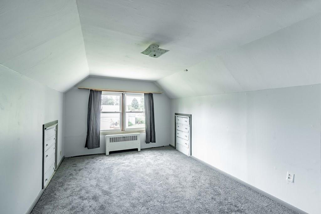 109 New Ludlow Road Granby, MA 01033 - Photo 42 of 42 an empty room with a empty space and windows