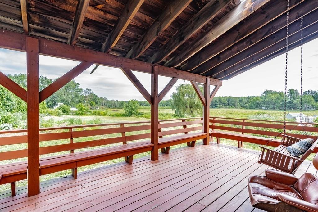 109 New Ludlow Road Granby, MA 01033 - Photo 5 of 42 a view of sitting area with deck and wooden floor