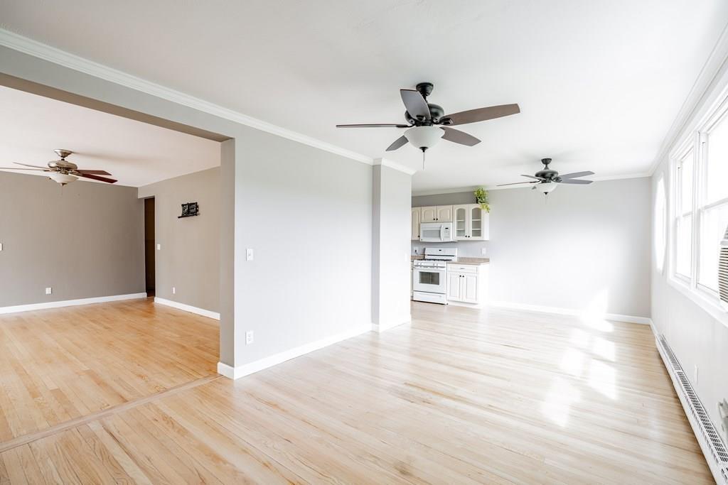 109 New Ludlow Road Granby, MA 01033 - Photo 9 of 42 wooden floor in an empty room with a window
