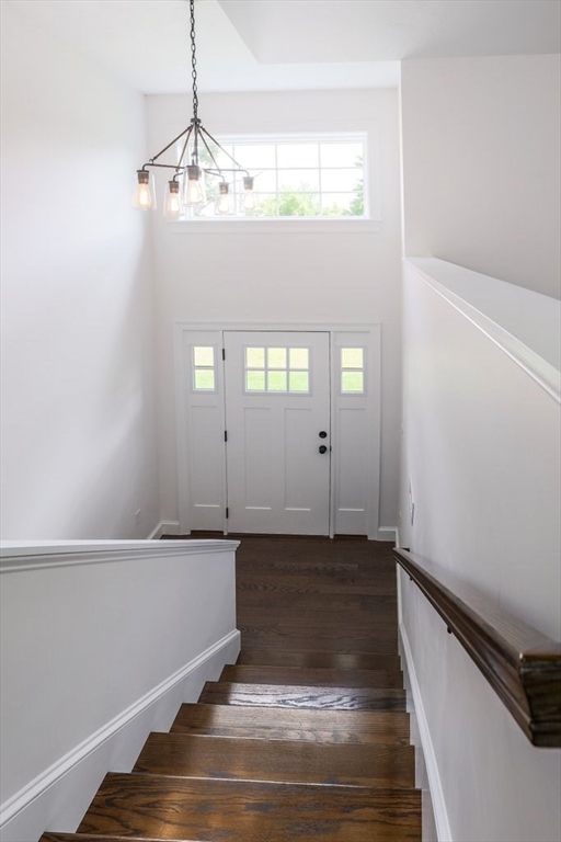 40 Jackson Lane Barre, MA 01005 - Photo 20 of 26 a view of a livingroom with wooden floor and staircase