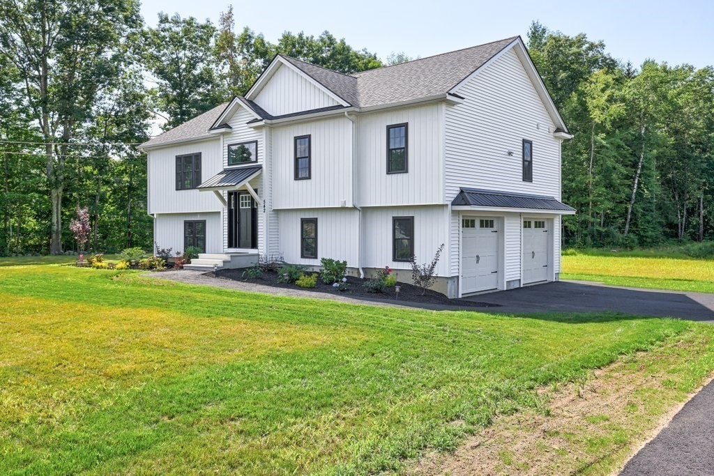 40 Jackson Lane Barre, MA 01005 - Photo 2 of 26 a front view of a house with a yard