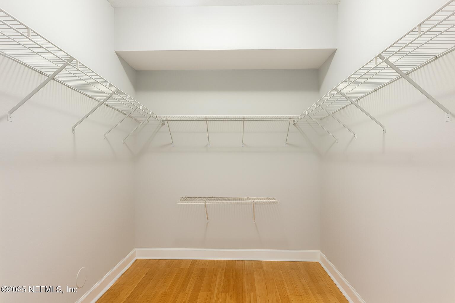 9745 Touchton Road, Unit 1701 Jacksonville, FL 32246 - Photo 14 of 30 a view of a room with racks on the wall