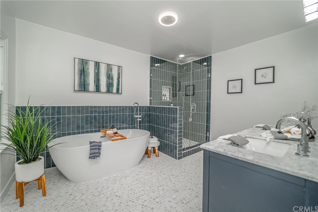 3880 Fairway Boulevard View Park, CA 90043 - Photo 30 of 47 a bathroom with a sink and a shower