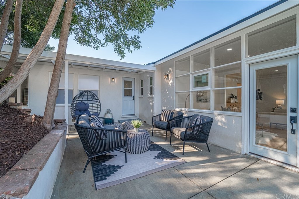 3880 Fairway Boulevard View Park, CA 90043 - Photo 40 of 47 a building outdoor space with patio furniture and potted plants