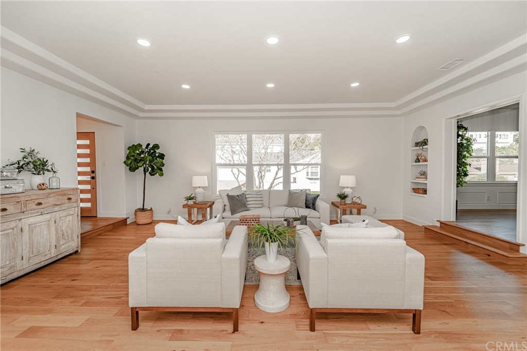 3880 Fairway Boulevard View Park, CA 90043 - Photo 7 of 47 a living room with furniture and a large window