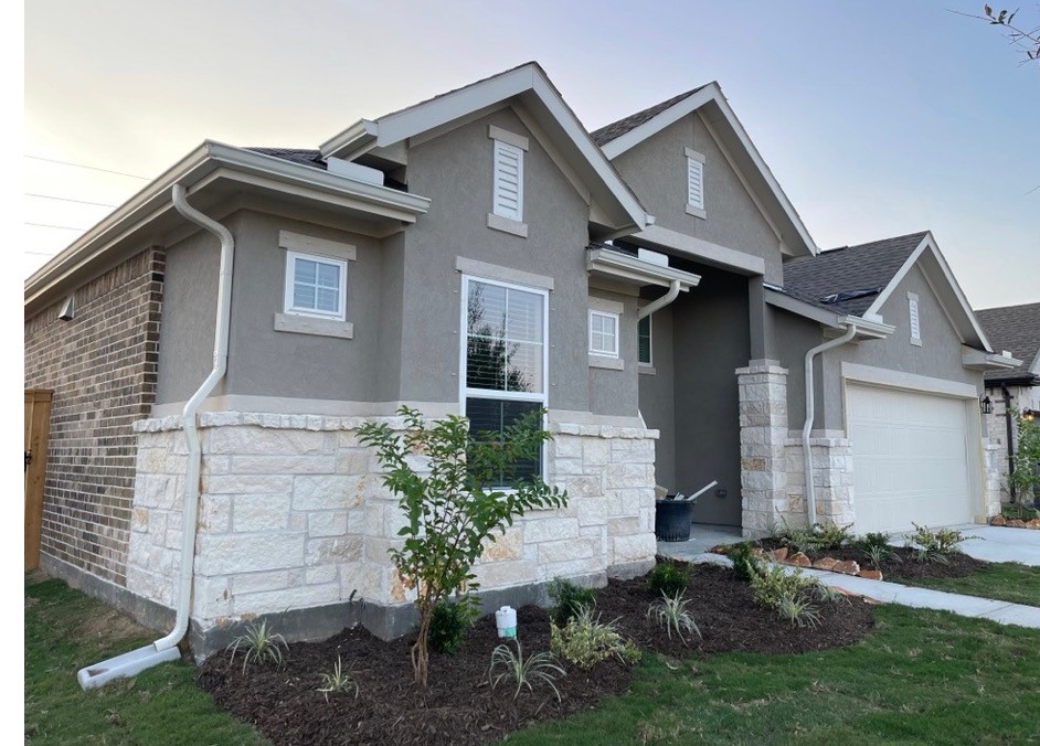 4507 Pistachio Trail Manvel, TX 77578 - Photo 2 of 9 a front view of a house with garden