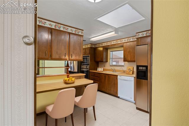 5505 Tamlin Road Colorado Springs, CO 80938 - Photo 4 of 15 “virtually staged”