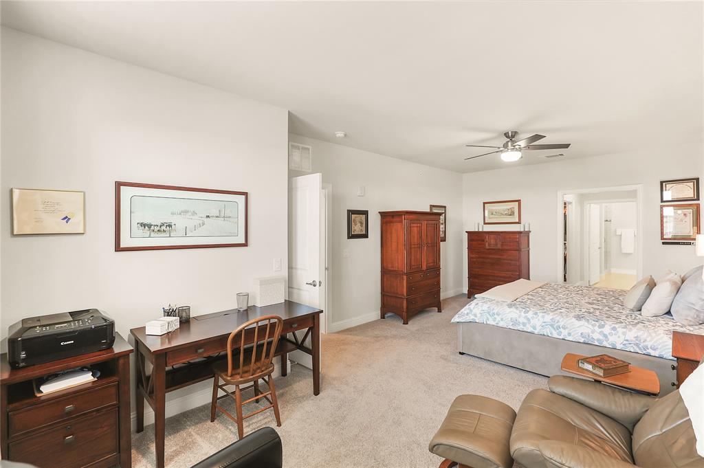 651 Watters Road, Unit 3404 Allen, TX 75013 - Photo 23 of 40 a living room with furniture and a dining table