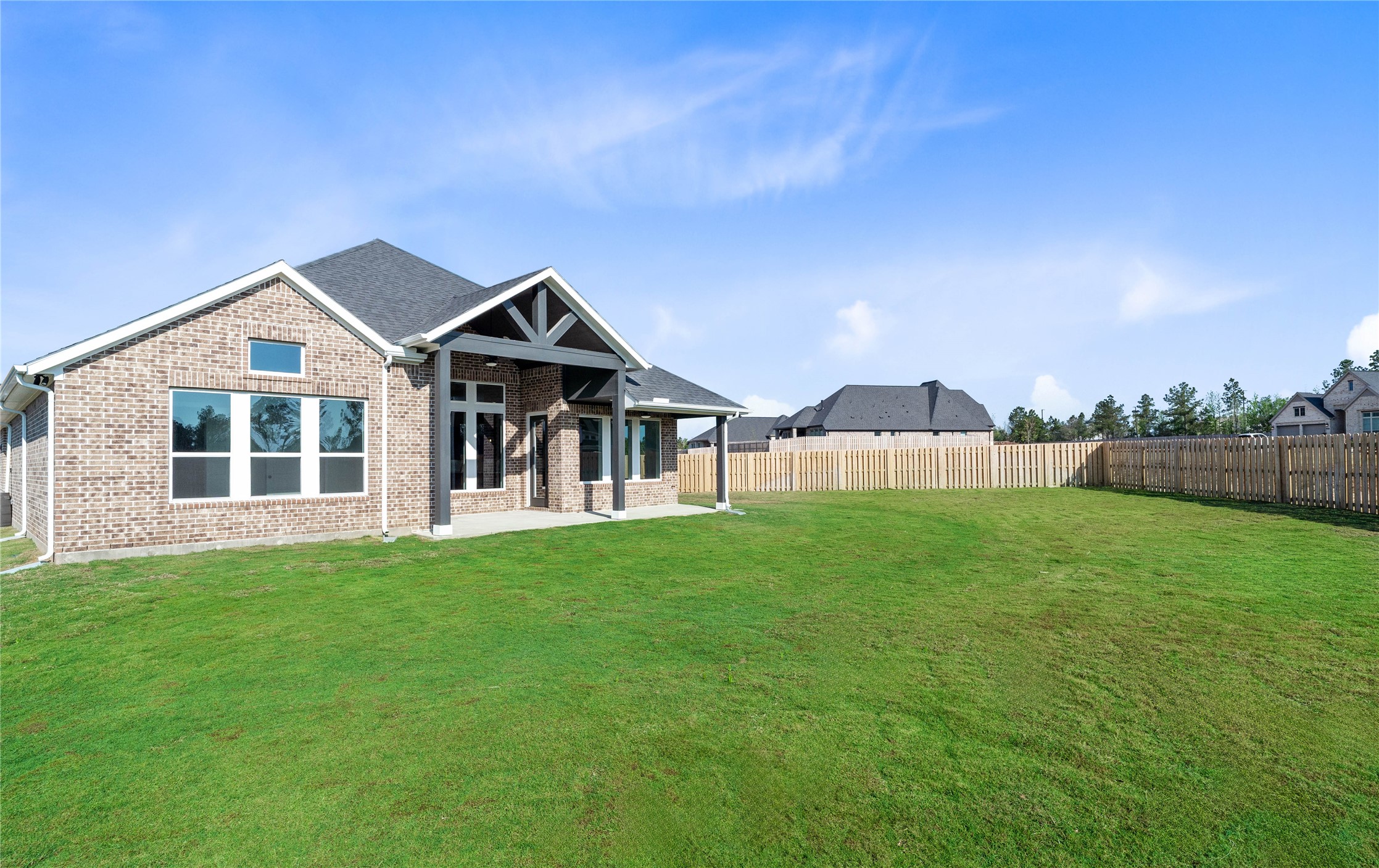 2114 Rowl Street Montgomery, TX 77316 - Photo 42 of 50 Bring your outdoor dreams to life in this massive, fully fenced backyard. This level, lush green space provides the perfect foundation for a custom pool, a sprawling deck, or a professional landscaping project.