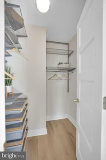 a view of a room with racks on the wall