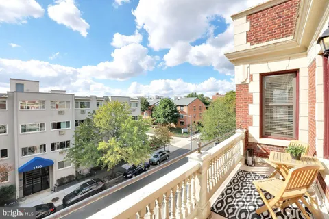 a view of balcony with a potted plant