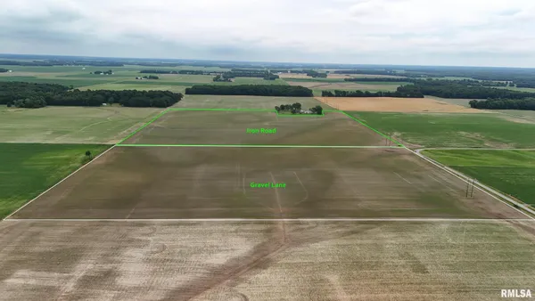 a picture of a bench in front of a building