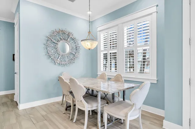 a view of a patio with a table chairs and a table