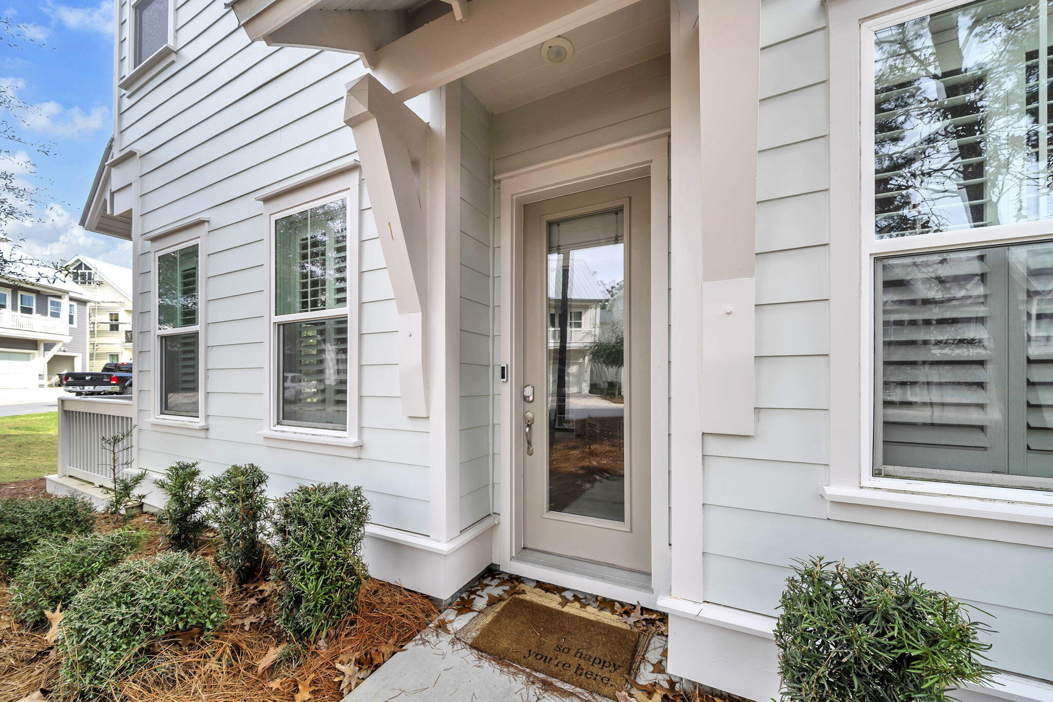 96 Dune Comet Lane, Unit A Inlet Beach, FL 32461 - Photo 2 of 47 a house with a potted plant in front of it