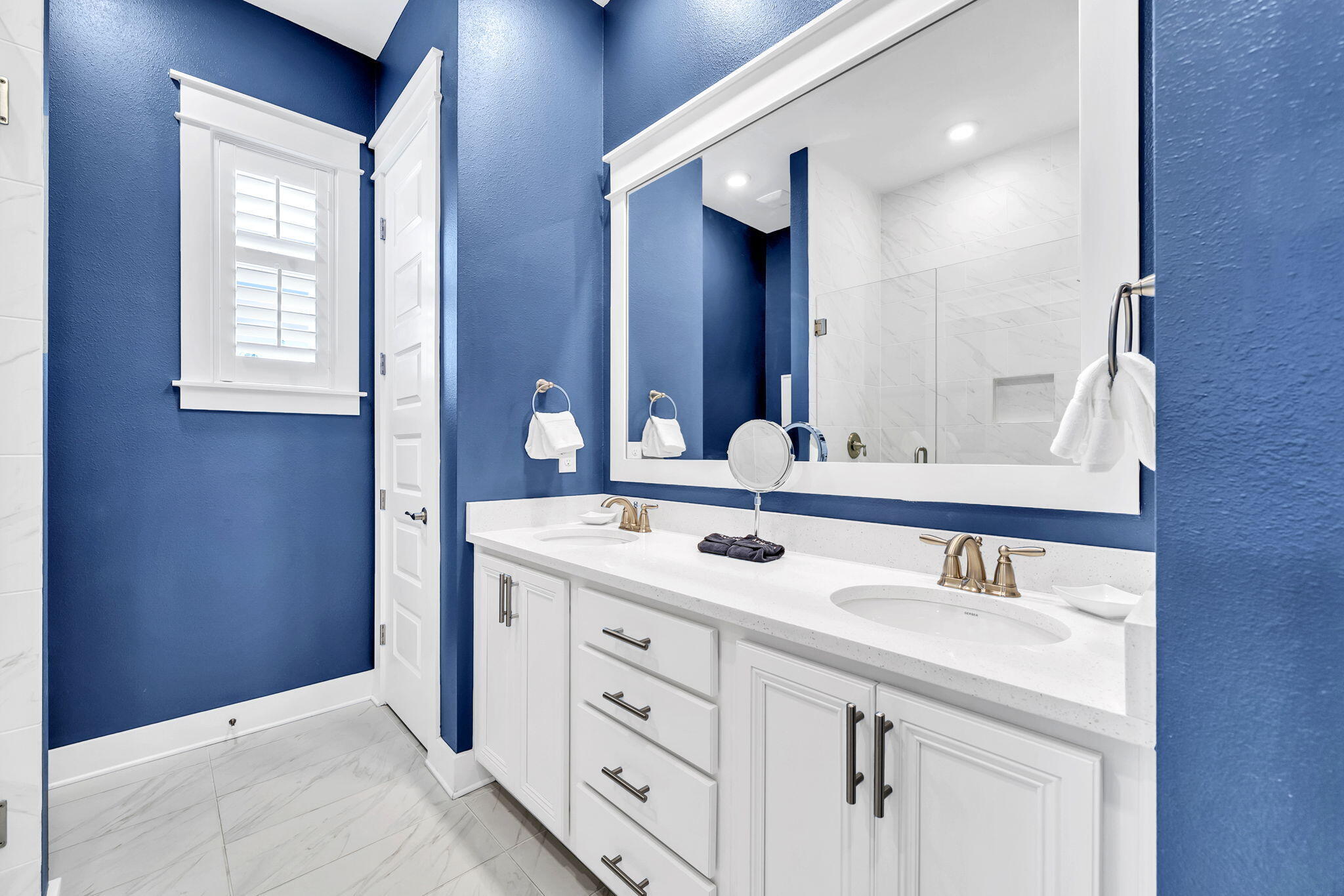 96 Dune Comet Lane, Unit A Inlet Beach, FL 32461 - Photo 23 of 47 a bathroom with a sink and a mirror