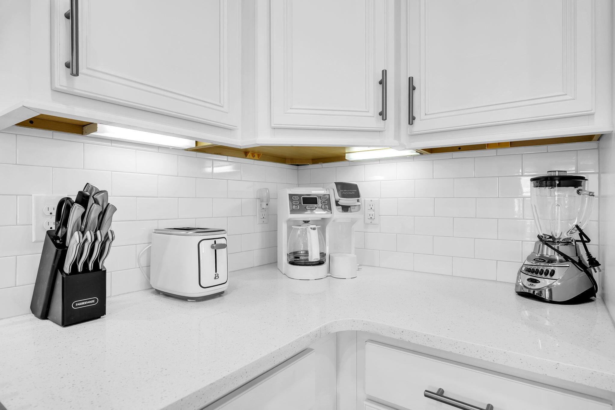 96 Dune Comet Lane, Unit A Inlet Beach, FL 32461 - Photo 6 of 47 a kitchen with a sink and a stove top oven