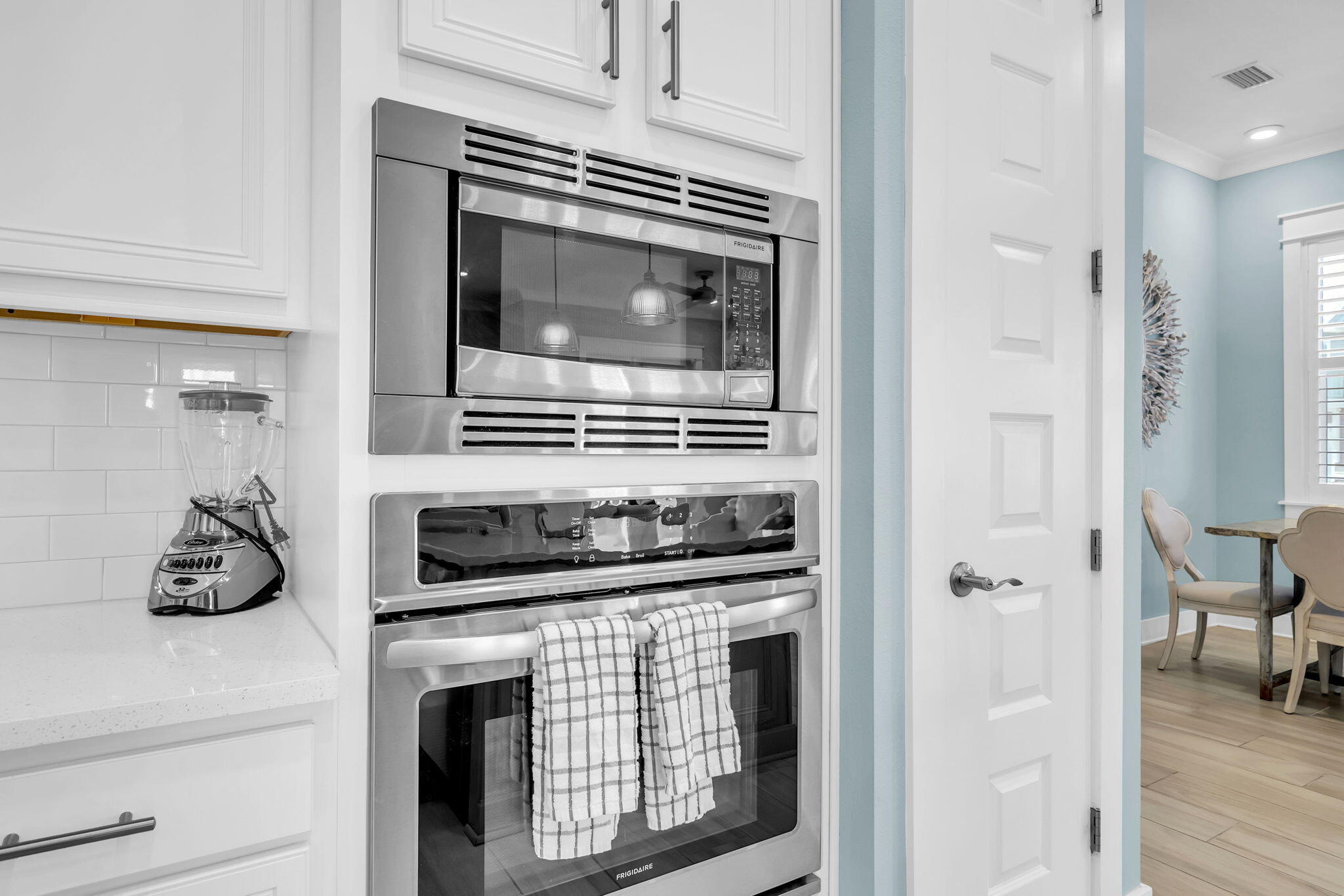 96 Dune Comet Lane, Unit A Inlet Beach, FL 32461 - Photo 7 of 47 a kitchen with stainless steel appliances granite countertop a stove and a microwave