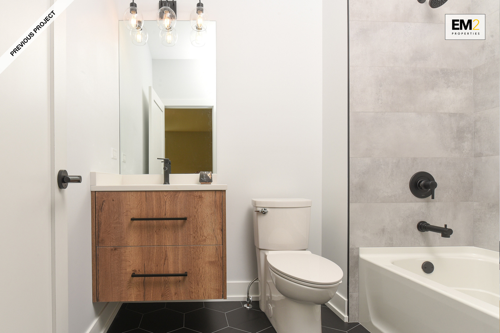 1402 Vine Avenue Park Ridge, IL 60068 - Photo 28 of 29 a bathroom with a sink a toilet and shower