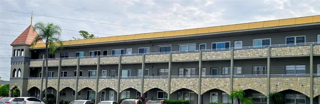 a front view of house with outdoor space and garden