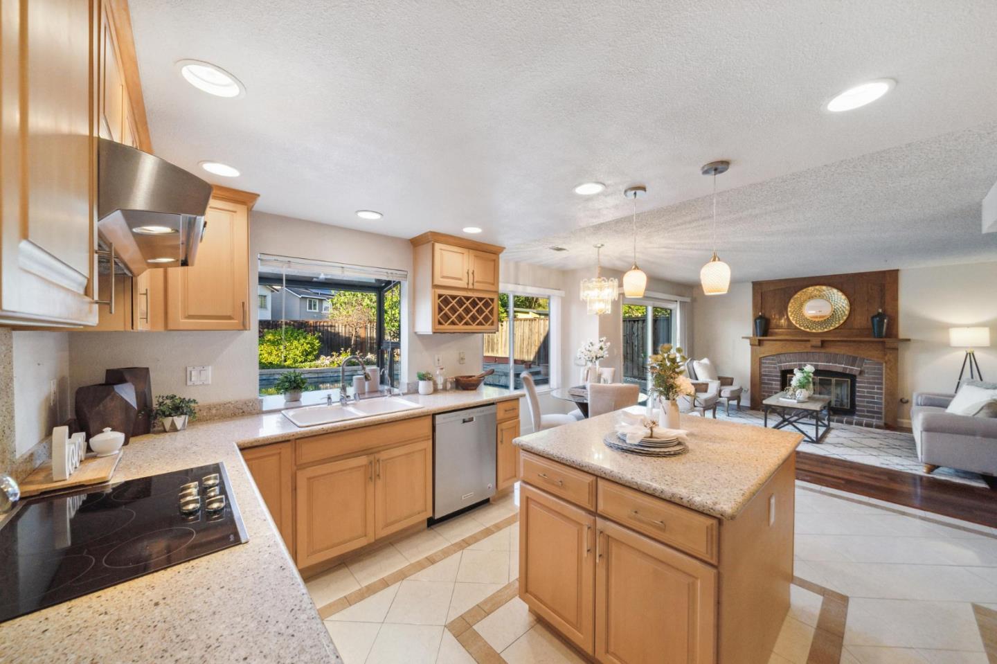 809 Terra Bella Drive Milpitas, CA 95035 - Photo 12 of 53 a kitchen with sink stove and cabinets