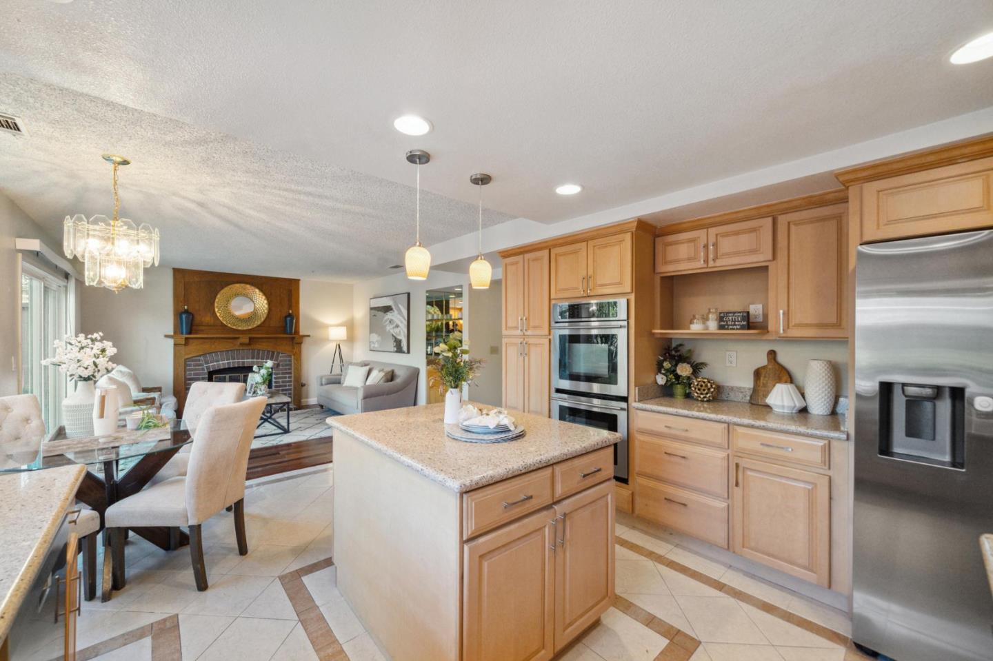 809 Terra Bella Drive Milpitas, CA 95035 - Photo 15 of 53 a view of a kitchen and dining room