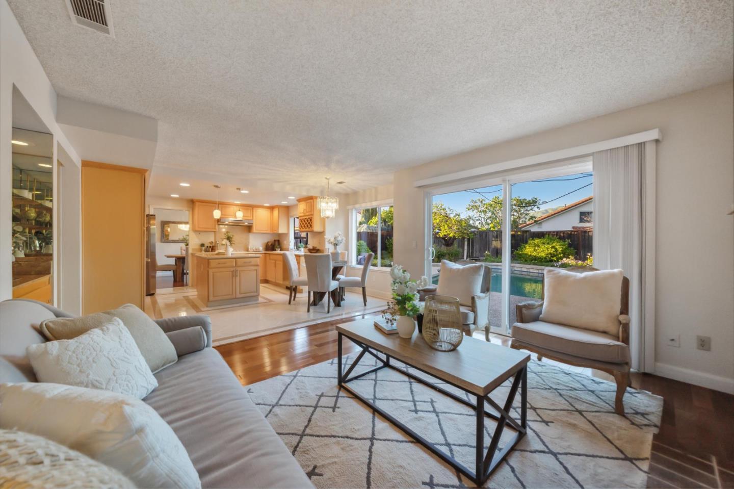 809 Terra Bella Drive Milpitas, CA 95035 - Photo 21 of 53 a living room with furniture and a large window