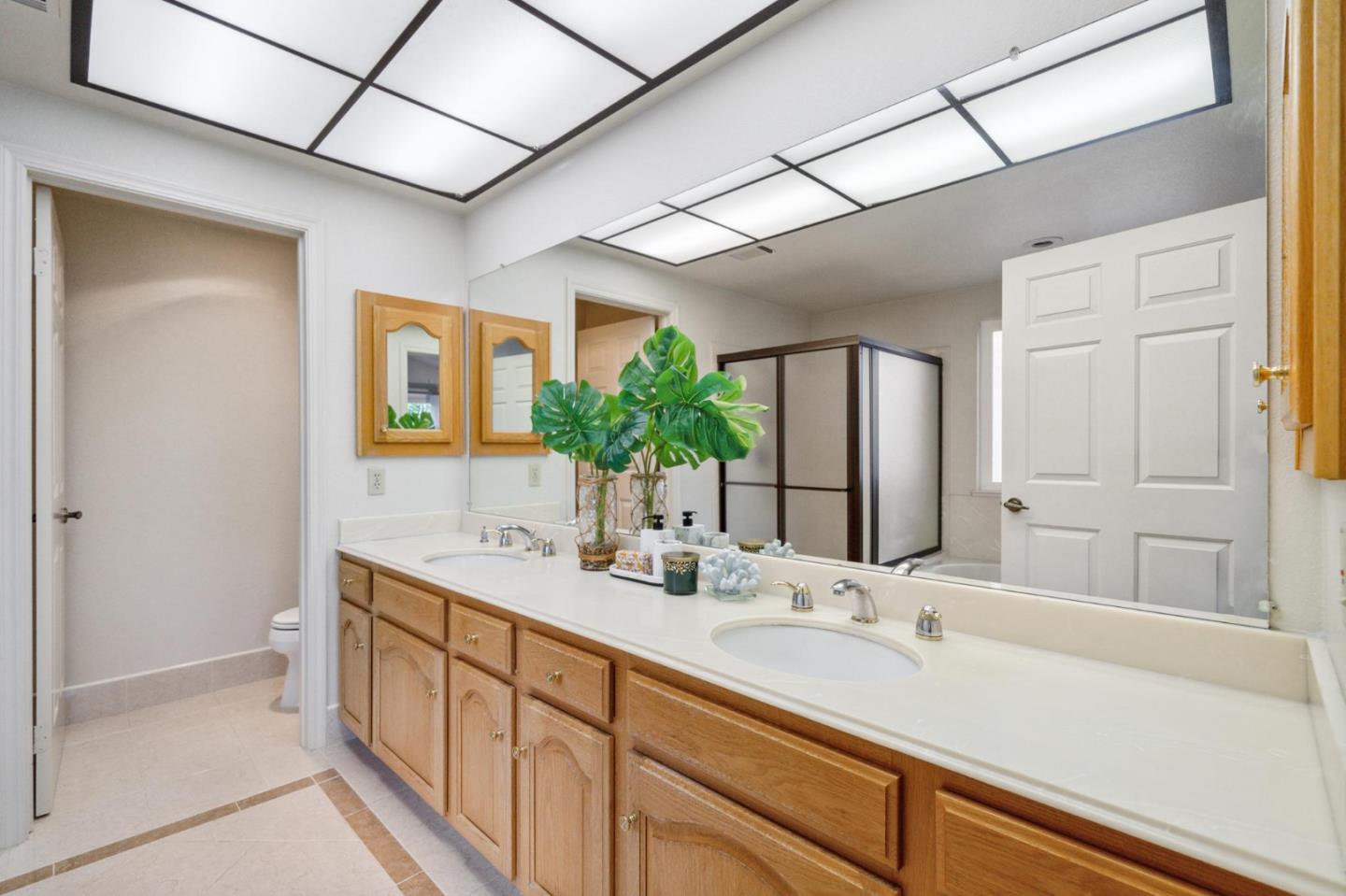 809 Terra Bella Drive Milpitas, CA 95035 - Photo 29 of 53 a bathroom with a sink and a mirror