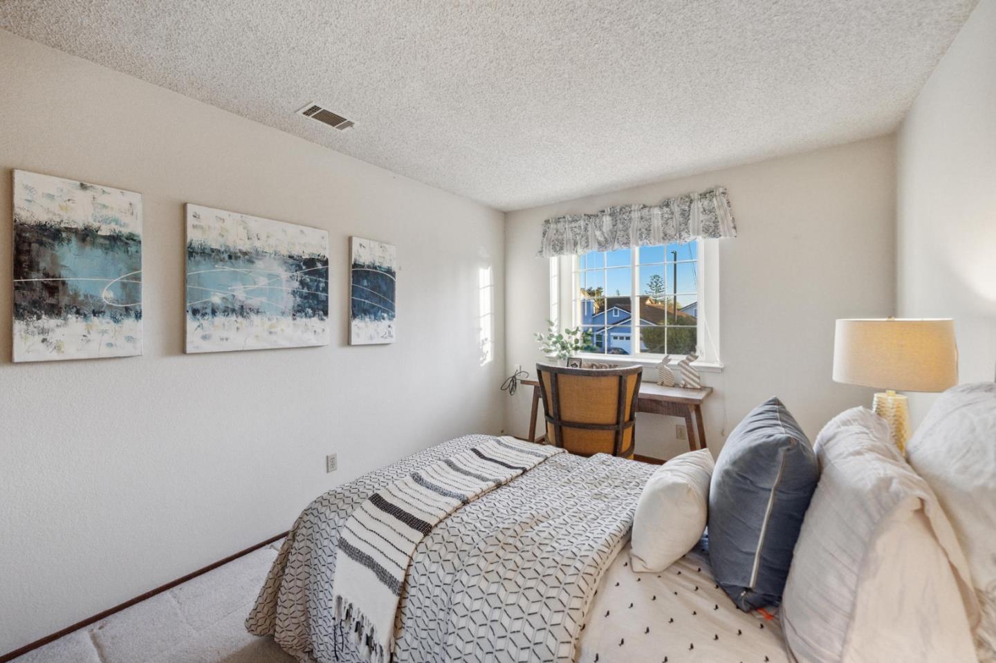 809 Terra Bella Drive Milpitas, CA 95035 - Photo 37 of 53 a bedroom with a bed and a large window