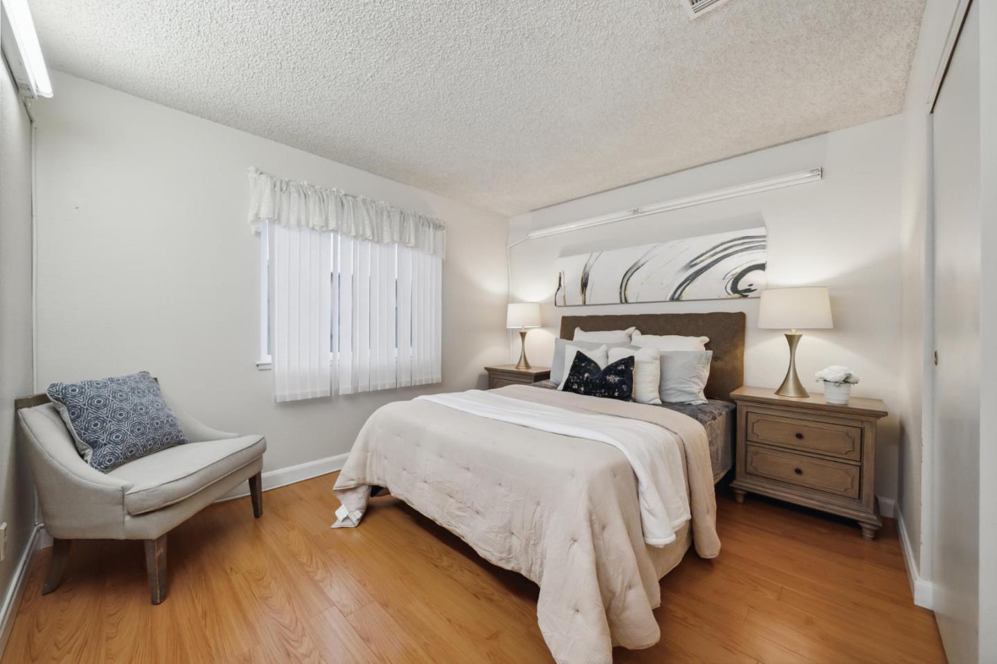 809 Terra Bella Drive Milpitas, CA 95035 - Photo 41 of 53 a bedroom with a bed and a couch