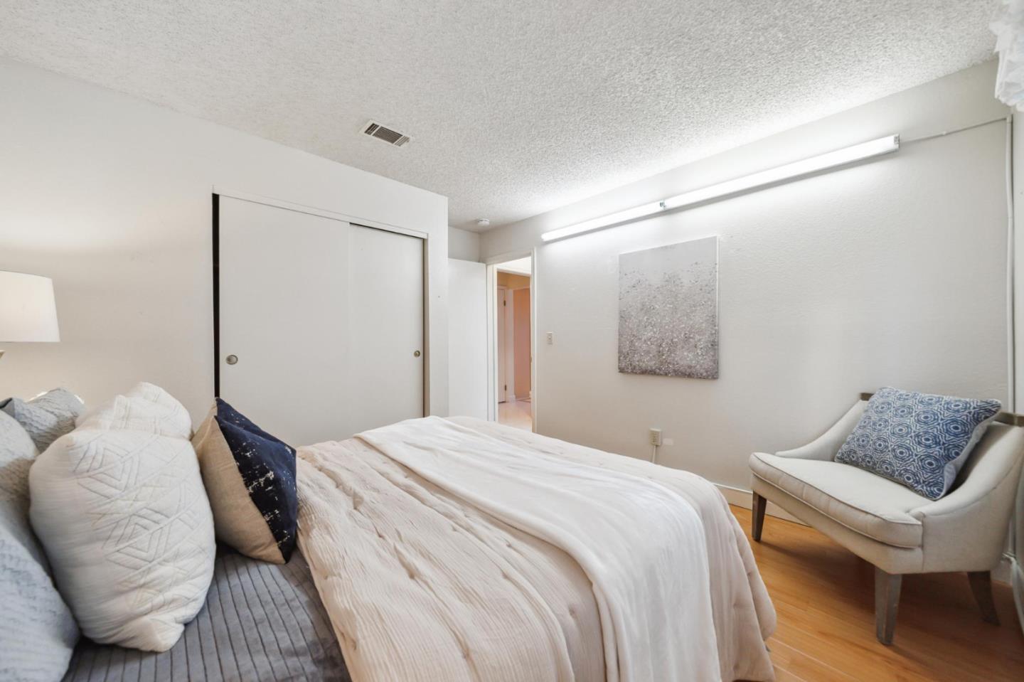 809 Terra Bella Drive Milpitas, CA 95035 - Photo 42 of 53 a bedroom with a bed and a couch