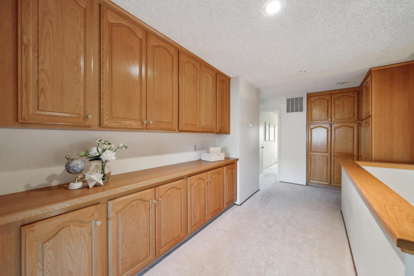 809 Terra Bella Drive Milpitas, CA 95035 - Photo 49 of 53 a kitchen with stainless steel appliances granite countertop a sink refrigerator and cabinets