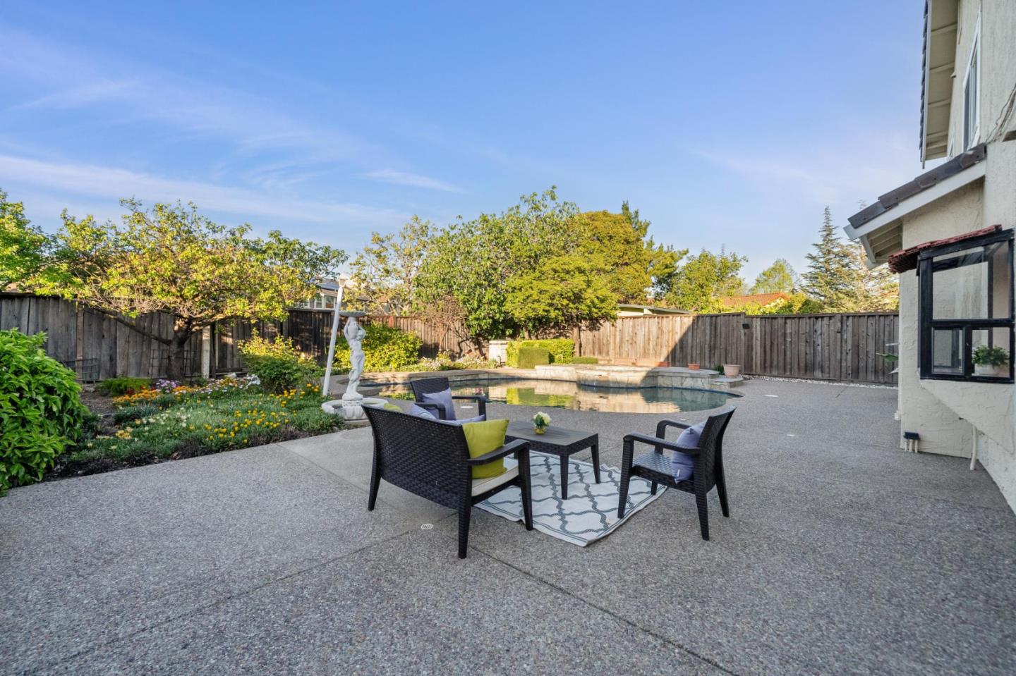 809 Terra Bella Drive Milpitas, CA 95035 - Photo 53 of 53 a view of a patio with table and chairs and potted plants with wooden fence