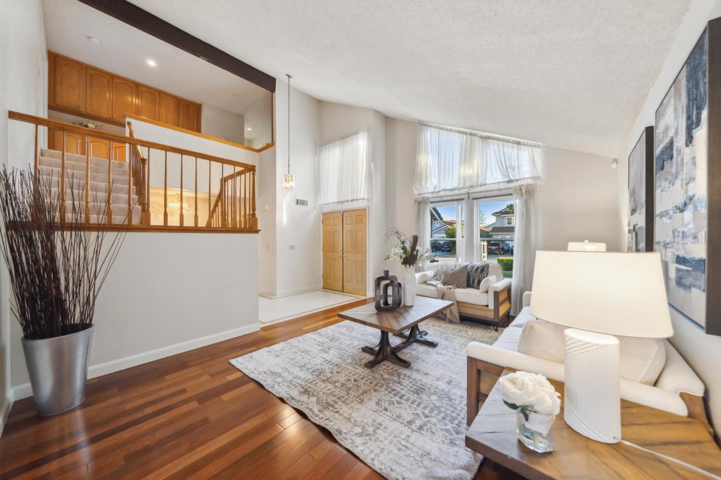 809 Terra Bella Drive Milpitas, CA 95035 - Photo 7 of 53 a living room with furniture and a rug