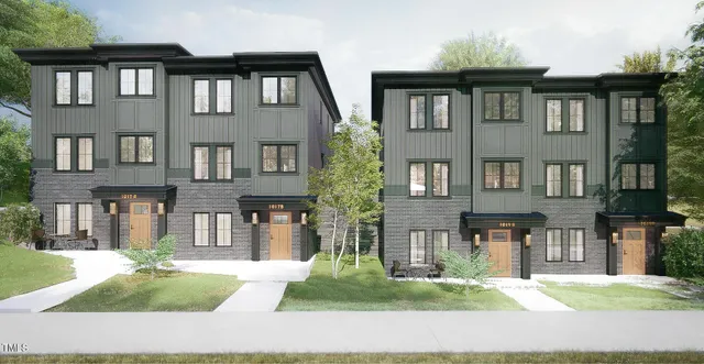 a front view of residential houses