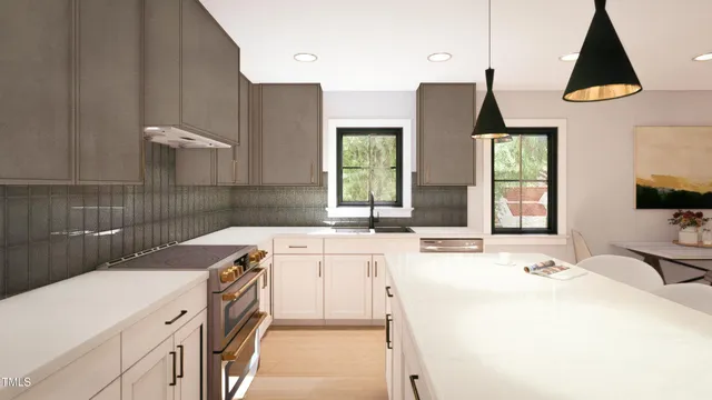 a kitchen with a sink and a stove