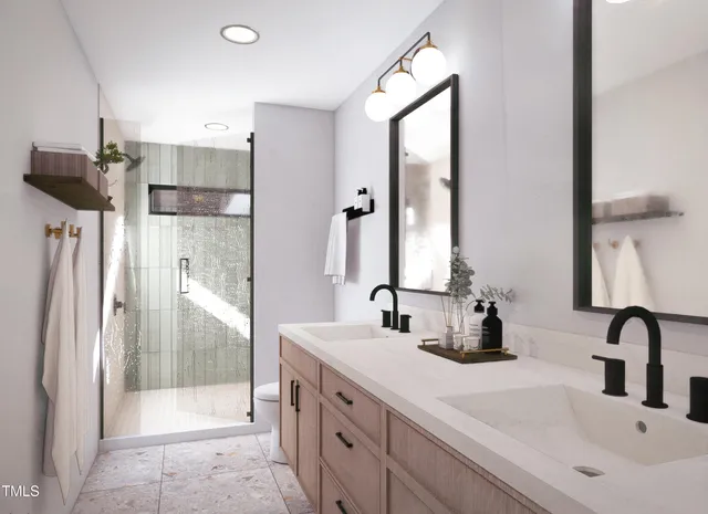 a bathroom with a double vanity sink and mirror