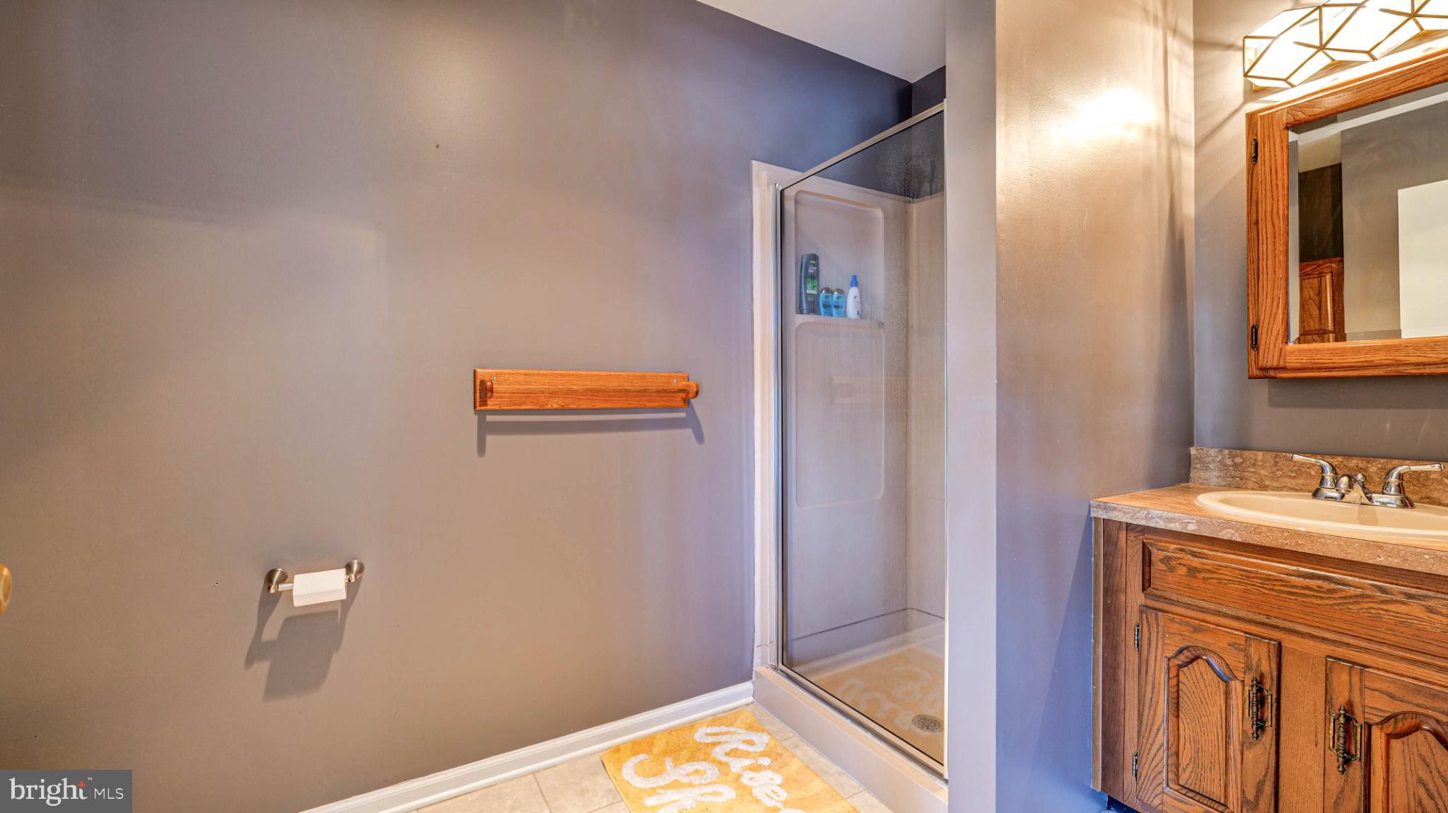 68 Wayside Road Berlin, NJ 08009 - Photo 15 of 38 Modern bathroom with sleek design elements.