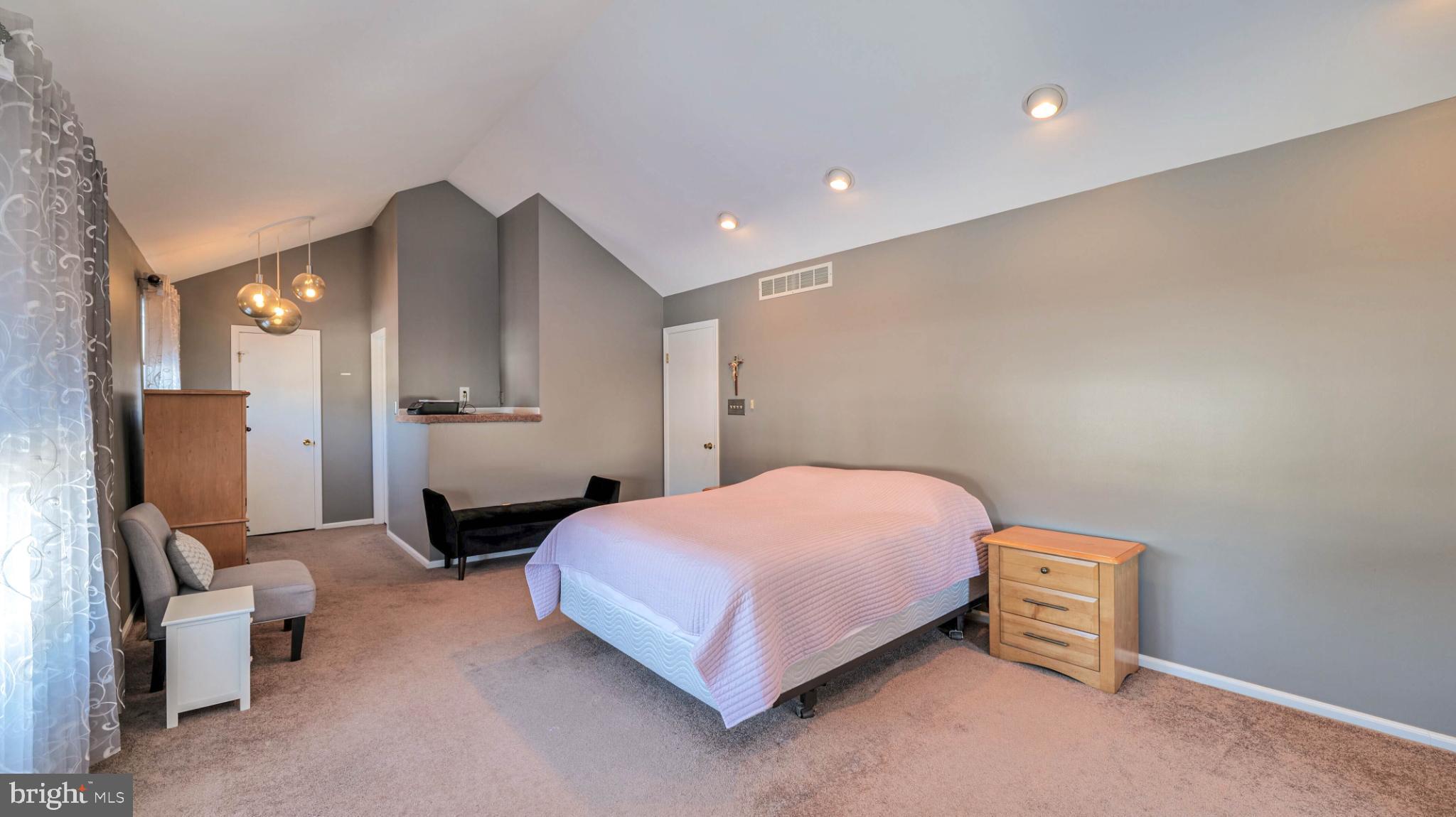 68 Wayside Road Berlin, NJ 08009 - Photo 20 of 38 Spacious bedroom with modern elegance.