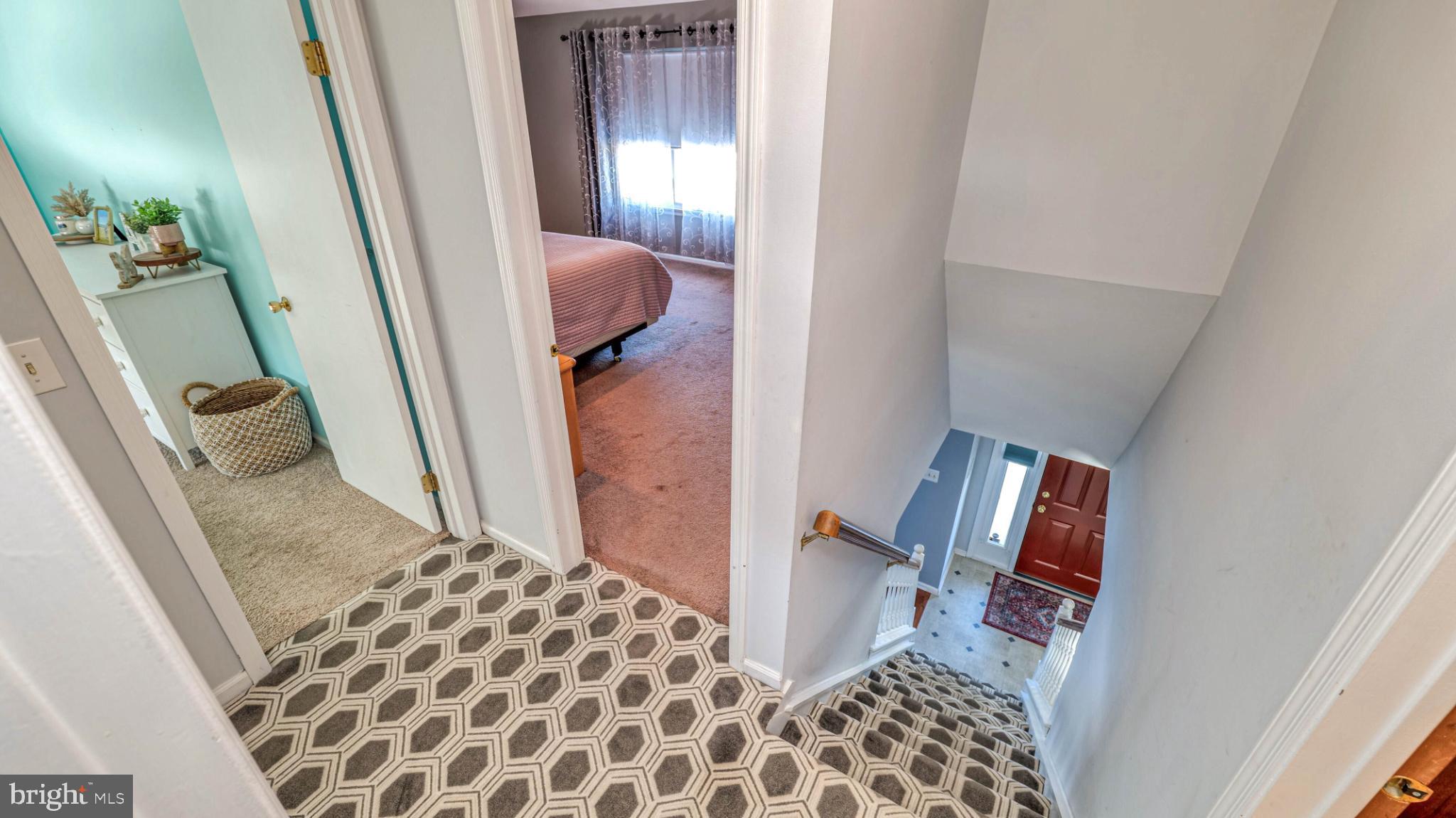 68 Wayside Road Berlin, NJ 08009 - Photo 23 of 38 Inviting staircase leads to cozy spaces.