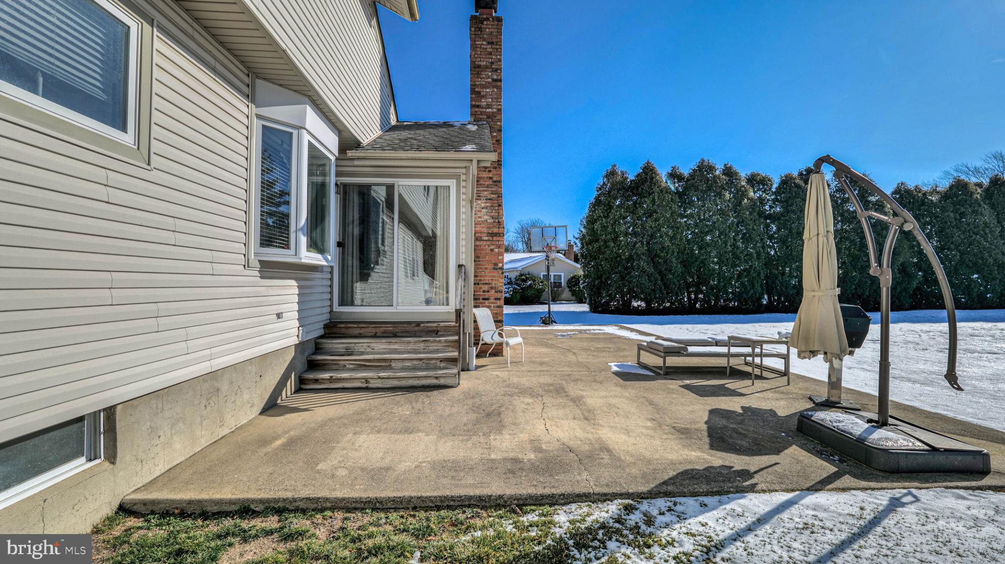 68 Wayside Road Berlin, NJ 08009 - Photo 29 of 38 Sunny patio retreat with serene views.