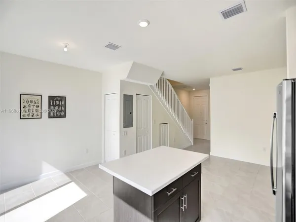 a view of kitchen and hallway